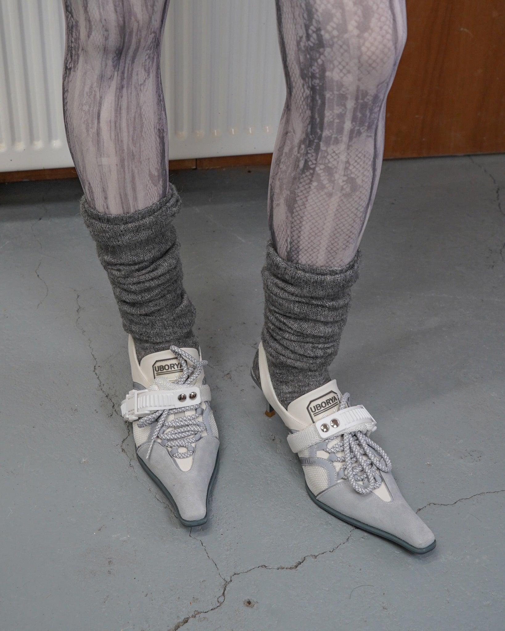 white lolita tights with high heel sandals and grey leg warmers