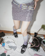 digital printed violet sheer high ankle socks with black kitten heel trainer and prada skirt