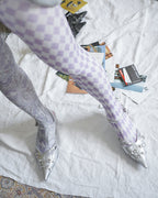 digital printed violet sheer tights with silver kitten heel sandals close up