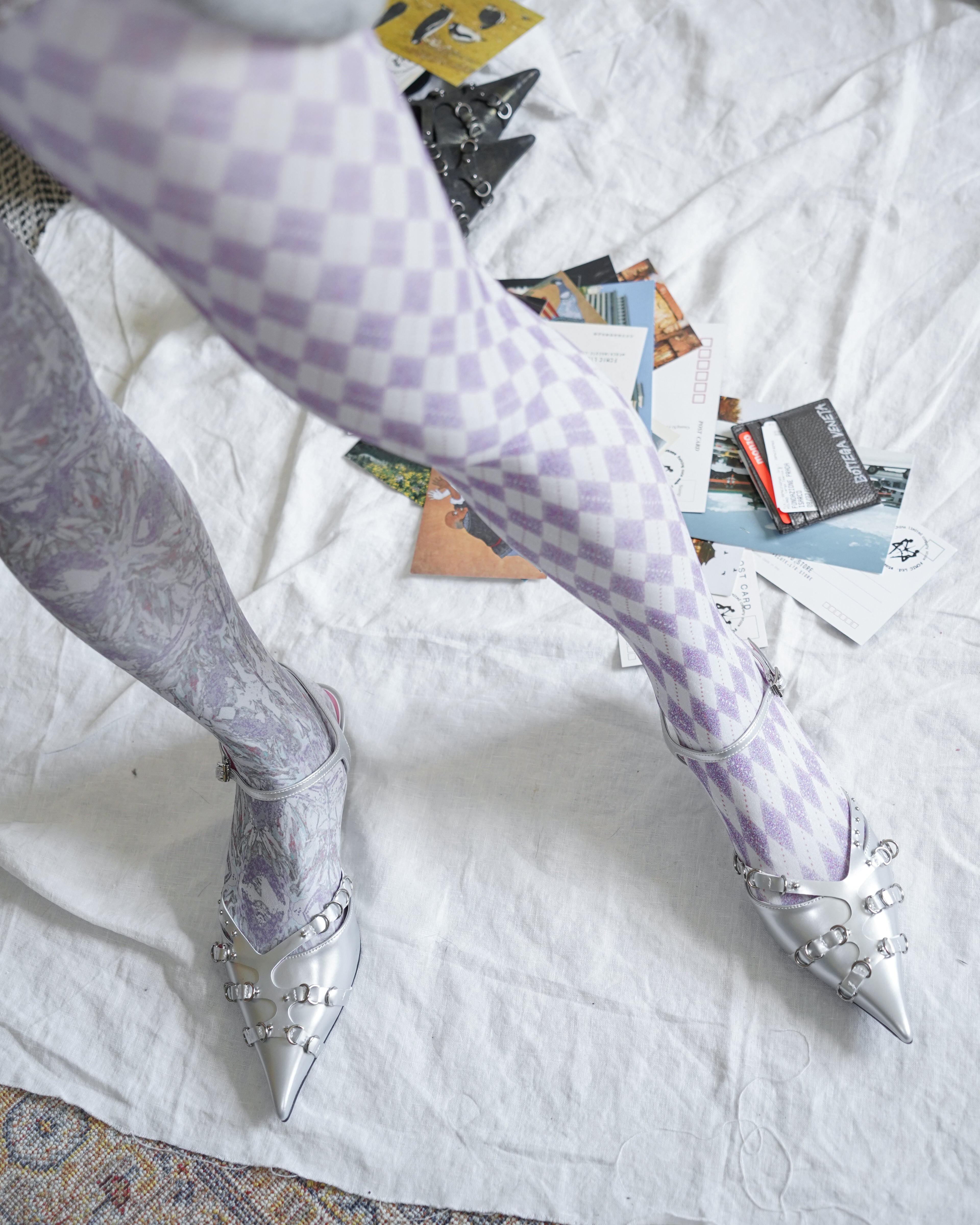 digital printed violet sheer tights with silver kitten heel sandals close up