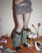 grey lace tights with miumiu bikini and denim leg warmer and silver black kitten heel trainer 