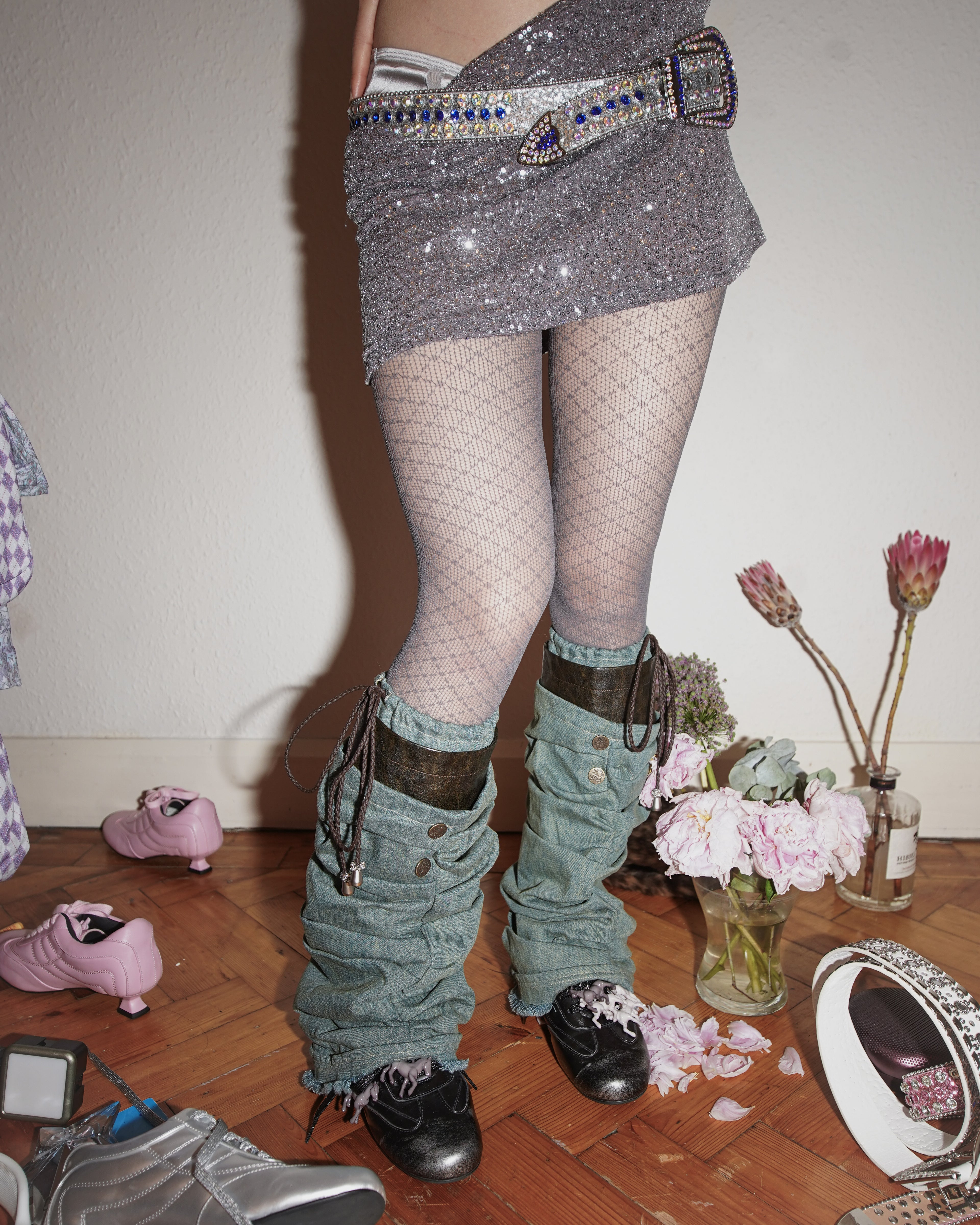 grey lace tights with miumiu bikini and denim leg warmer and silver black kitten heel trainer 