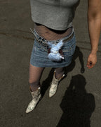 grey lace tights with white butterfly cow boy boots and blumarine silver belt