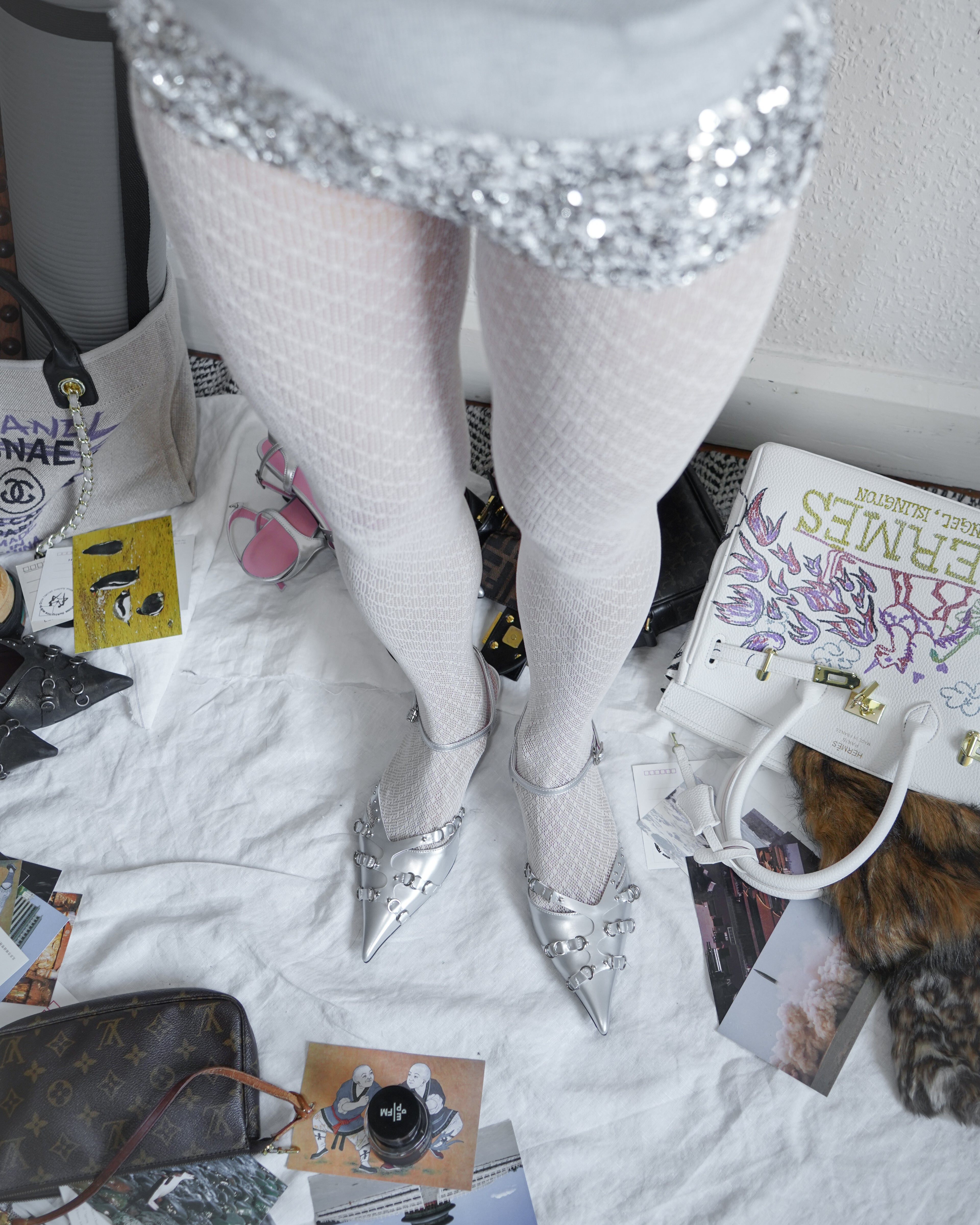 white lace tights close up with silver prada sandals and miumiu biniki