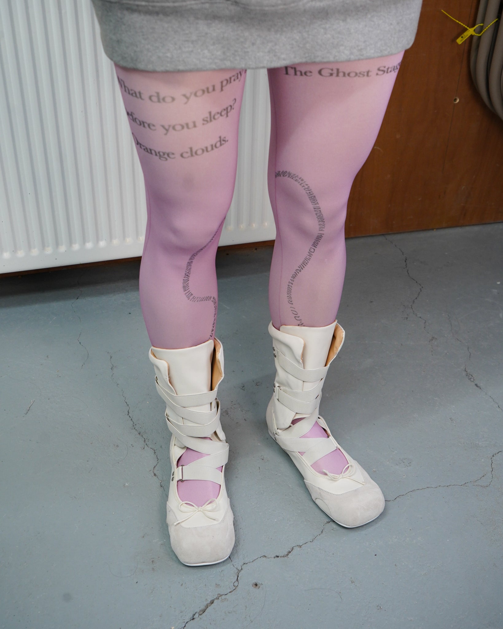 pink printed tights with white ballet boots