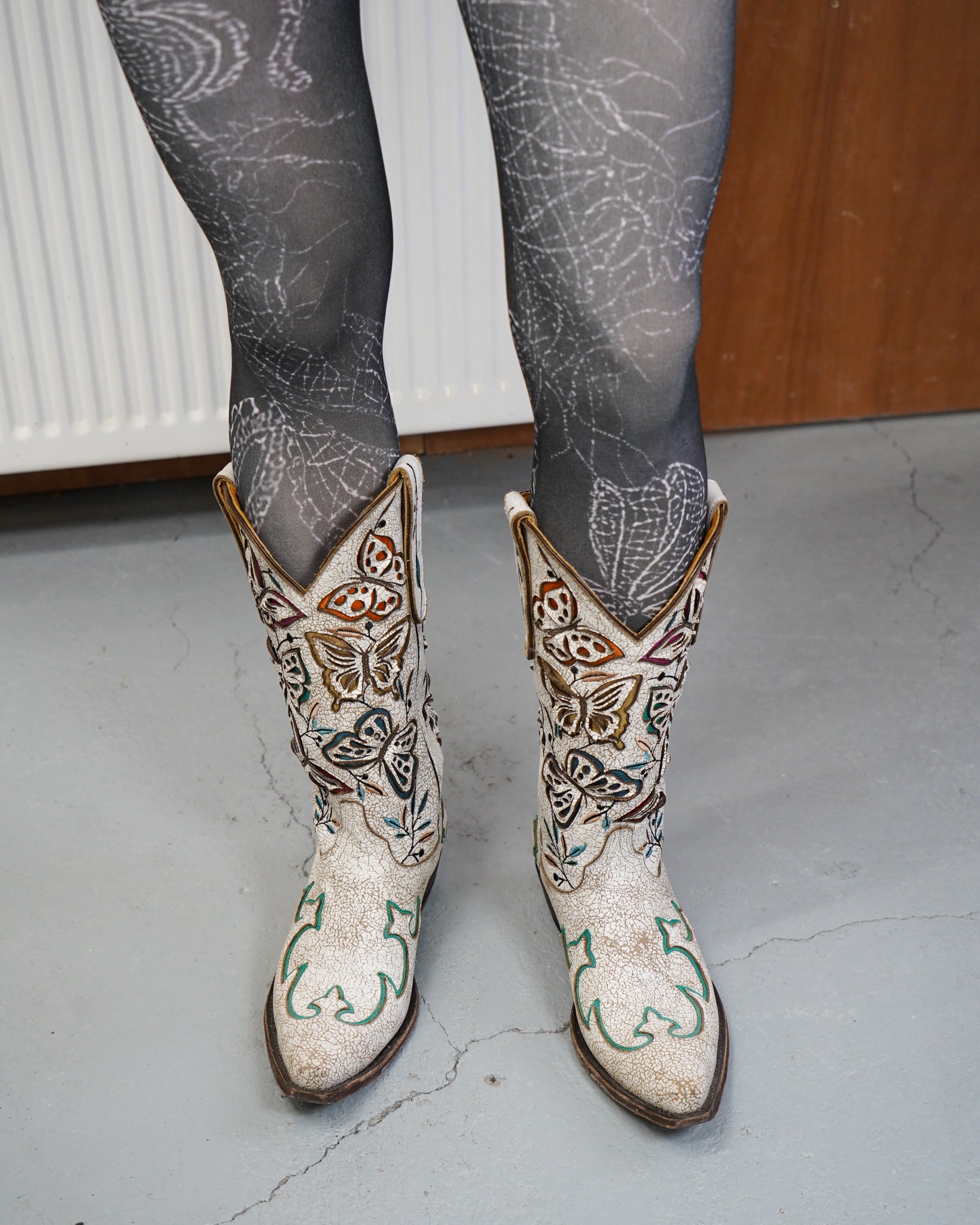 black bow ribbon sheer tights with white butterfly cow boy boots
