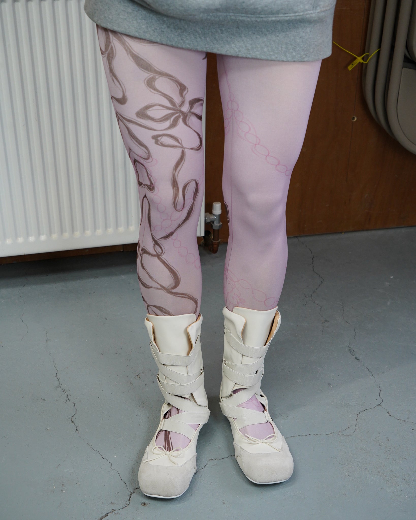 digital printed pink sheer tights with miumiu ballet boots front angle