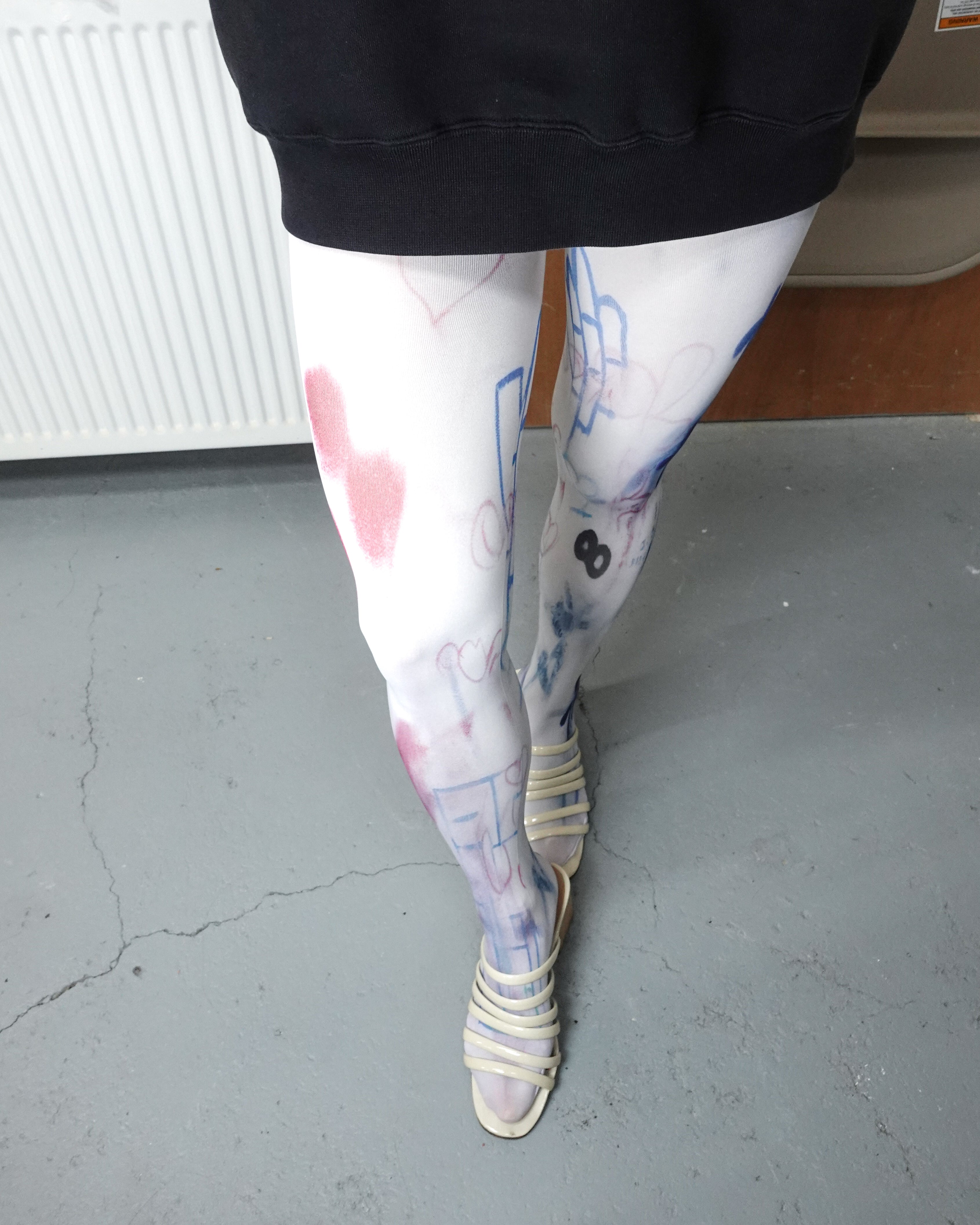 digital graffiti printed tights with paloma wool sandals