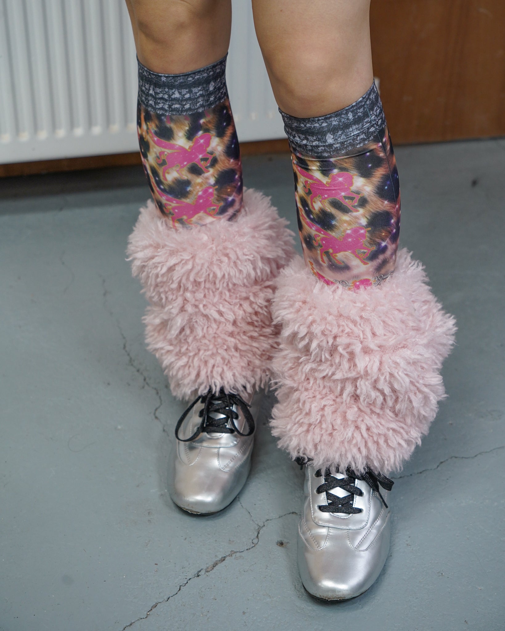 pink faux fur leg warmer with high ankle socks and silver kitten heel trainer