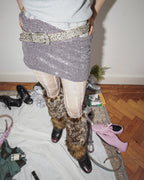 gradient fishnet tights with leopard printed leg warmer and mini skirt