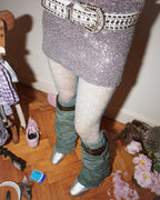blue fishnet tights with leg warmer and mini skirt